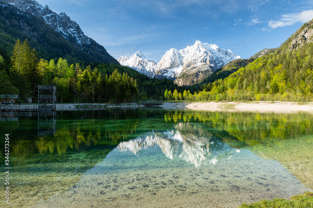 Naklejka premium Jasna lake at Kranjska Gora in Slovenia, Europe on a beautiful spring morning.