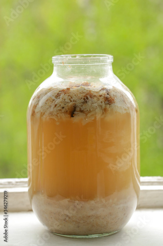 a can of kvass stands on a windowsill
