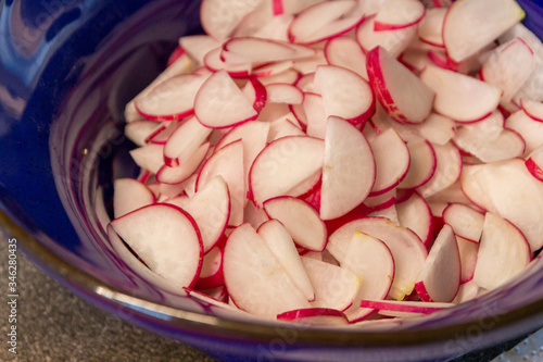 sliced radish in a kitchen bowl
