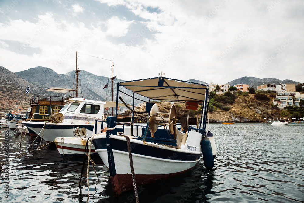 Fototapeta premium beautiful greek bay with a boat on the water
