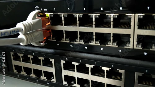 Close up of Server Switch Ethernet with Lights Blinking and Cables