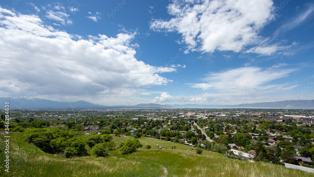 Wide angle view over Provo, Utah with clouds in the sky.