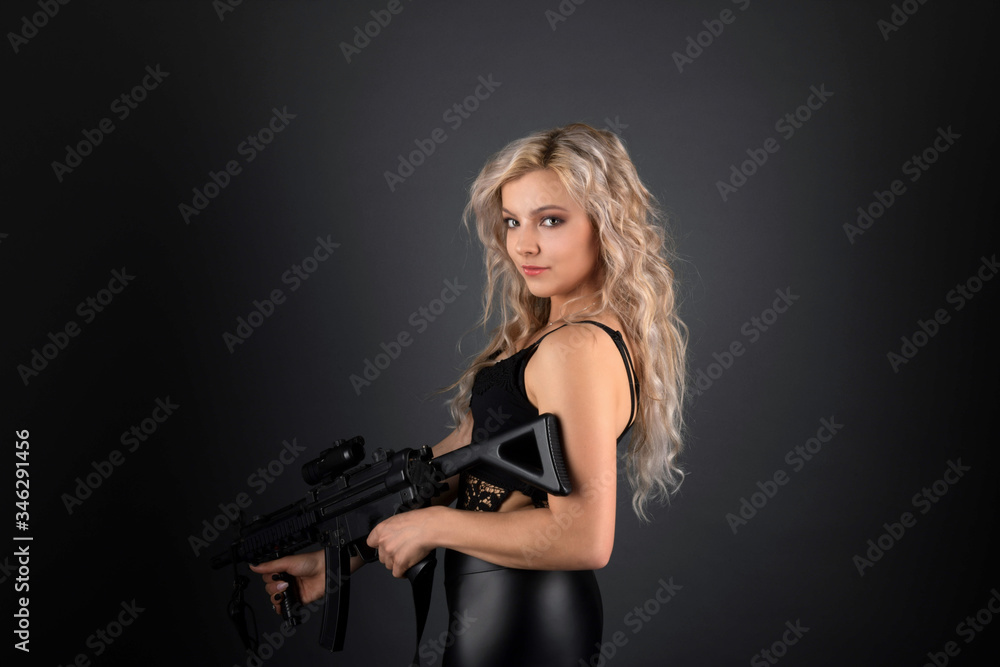 beautiful sexy girl holding gun 
