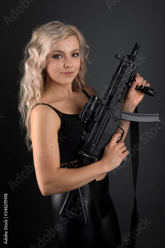 beautiful sexy girl holding gun  © muro