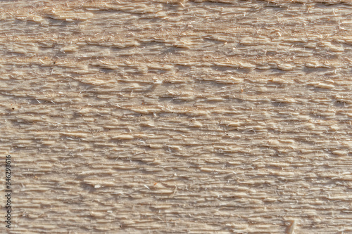 Surface of an unpolished wooden board.Abstract texture, creative background