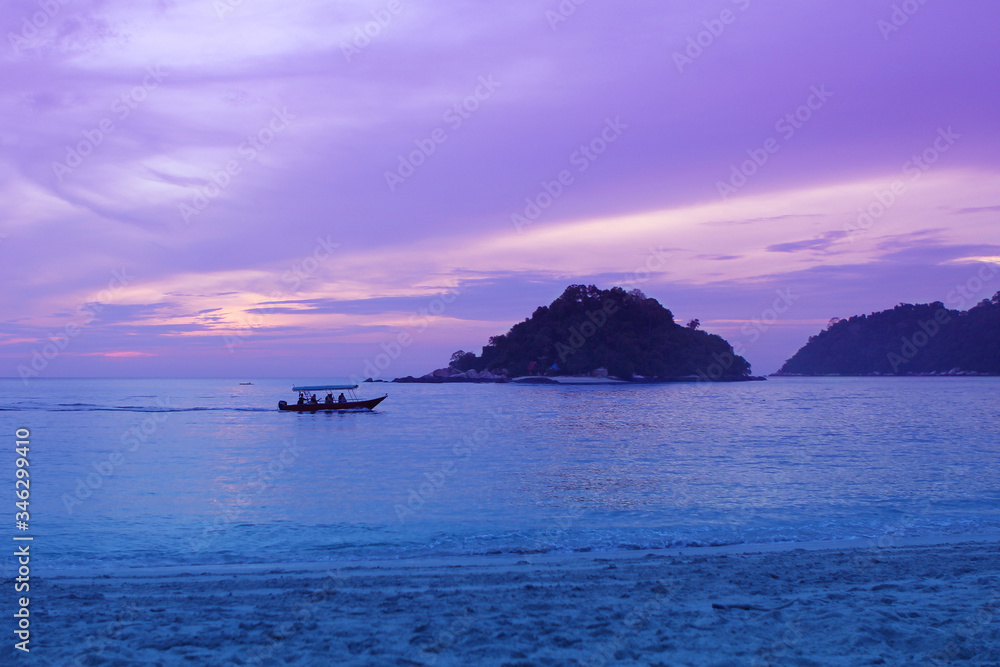 beautiful purple romantic sunset on the sea, islands darken in the distance, asia, vacation concept, travel beautiful purple romantic sunset on the sea, islands darken in the distance, asia, vacation concept, travel