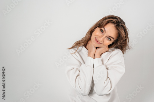 Portrait of beautiful female model on white background