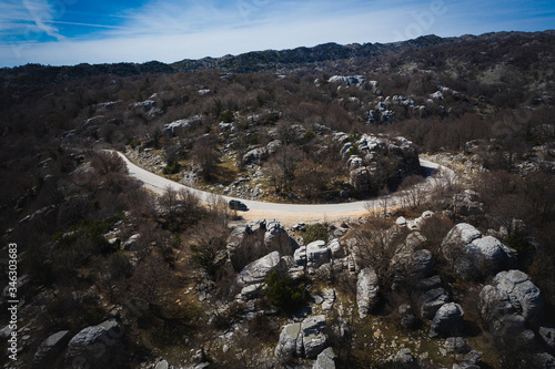 Stone forest, famous natural sightseeing (located between Monodendri village and Oxia viewpoint at Zagorochoria, Epirus, Greece) at winter. Natural geological formation. photo