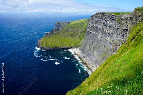 Scenic Overlook at the Cliffs of Moher in Ireland. Rugged Cliffs on the Irish Coastline on a Sunny Day. © Branden