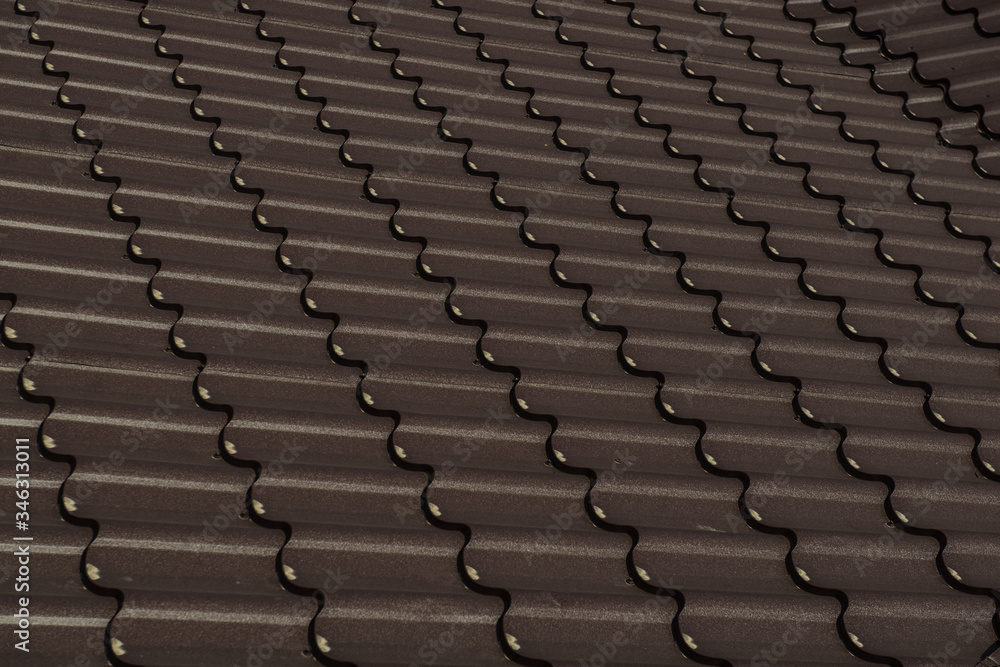 Fototapeta premium Close up a part of a brown roof of a house.