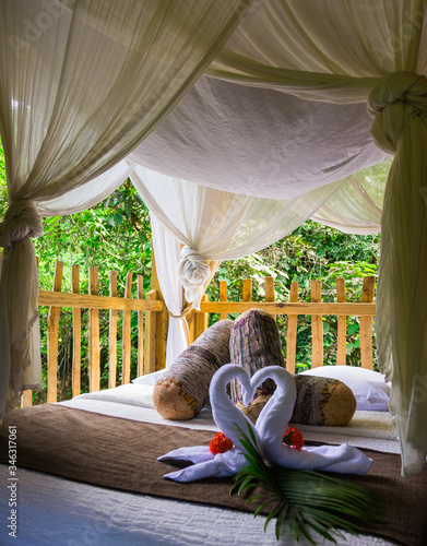 Romantic honeymoon bed perched on a jungle tree, Pointe Noire , Guadeloupe photo