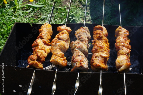 meat on the grill. Shick kebab on the grill photo