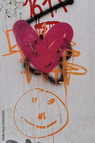 pink heart graffiti on the wall