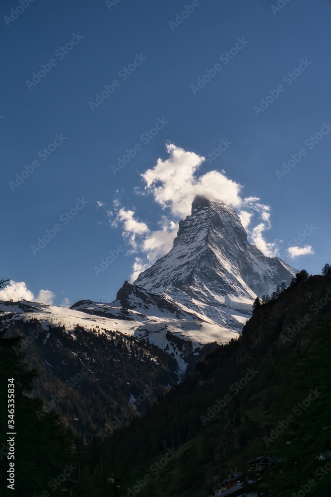 Panoramic view of Matterhorn peak in Zermatt  covered with snow.