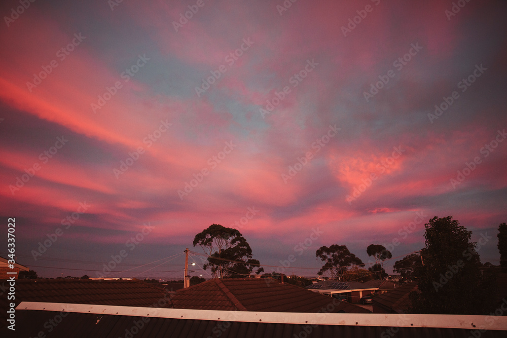 Beautiful Red Sunset Sky Over Town Houses