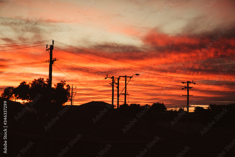 Beautiful Red Sunset Sky Over Town Houses