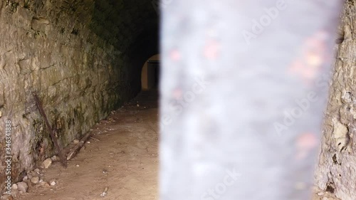 A cinematic shot of an entrance to a hidden cave 4k gimbal photo