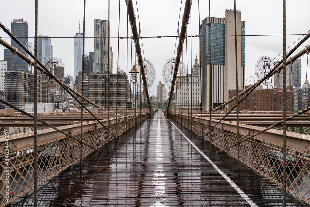 Obraz premium Brooklyn bridge. Rainy Brooklyn bridge view. Brooklyn bridge close up view. Rainy day at Brooklyn bridge. 