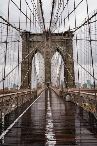 Brooklyn bridge. Rainy Brooklyn bridge view. Brooklyn bridge close up view. Rainy day at Brooklyn bridge.  © tanya