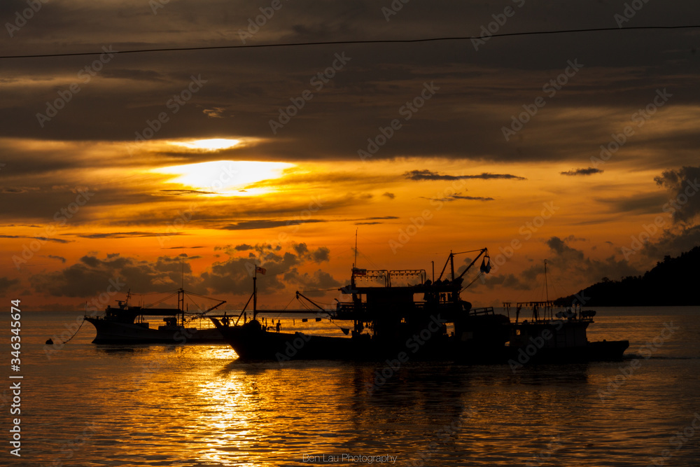 Sabah Sunset over the sea & fishermen