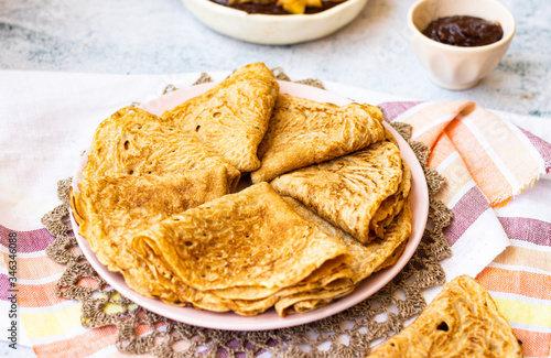 Homemade french crepes or folded thin pancakes. Sweet vegan dessert.