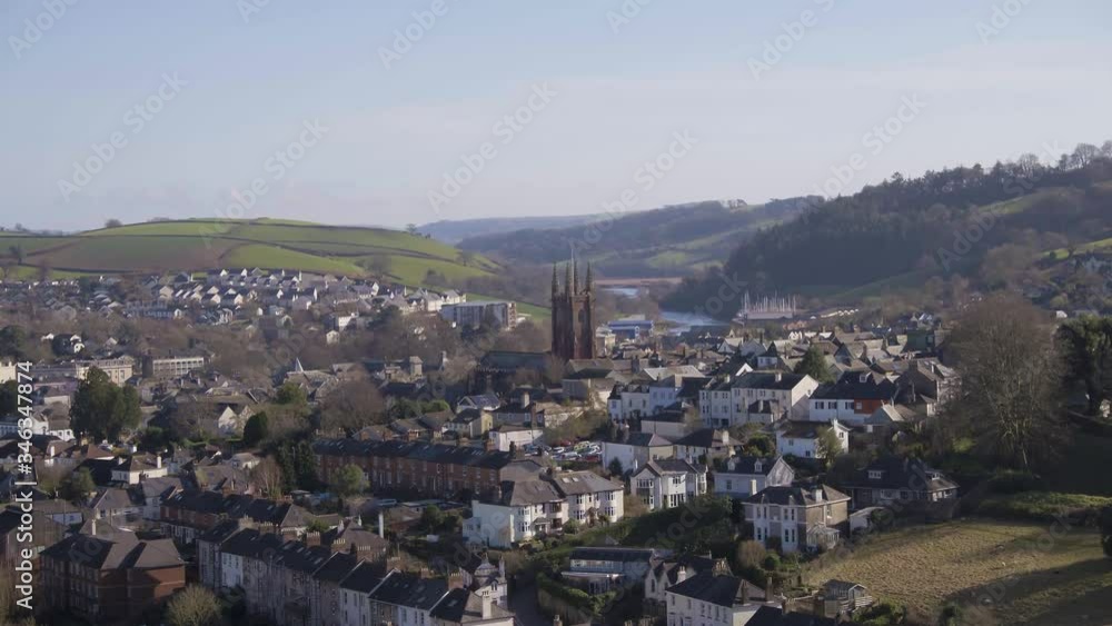 Three dimensional like perspective of Totnes, Devon. church and building in foreground higher than the residential district behind. Three dimensional like perspective of Totnes, Devon. church and building in foreground higher than the residential district behind.