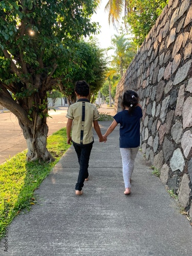young couple walking in the park