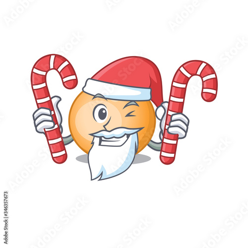 Friendly staphylocuccus aureus in Santa Cartoon character holds Christmas candies