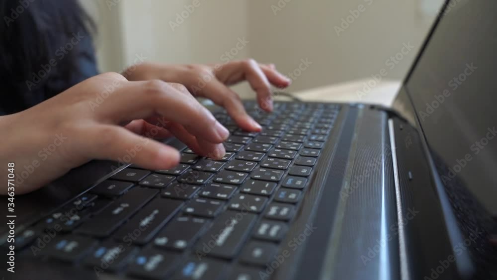Slow motion close-up scene women's hands are typing keyboards during work from home. Documenting,email,or chating in work from home concept close up shot in Apple Proress 422(HQ) 3840x2160 resolution. Slow motion close-up scene women's hands are typing keyboards during work from home. Documenting,email,or chating in work from home concept close up shot in Apple Proress 422(HQ) 3840x2160 resolution.