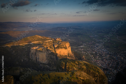 Mysterious hanging over rocks monasteries of Meteora  Greece at sunrise time