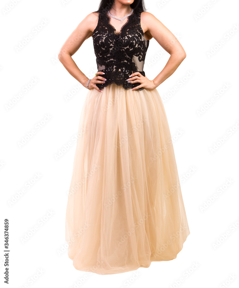 Beautiful woman dressed in evening gown over white background Beautiful woman dressed in evening gown over white background