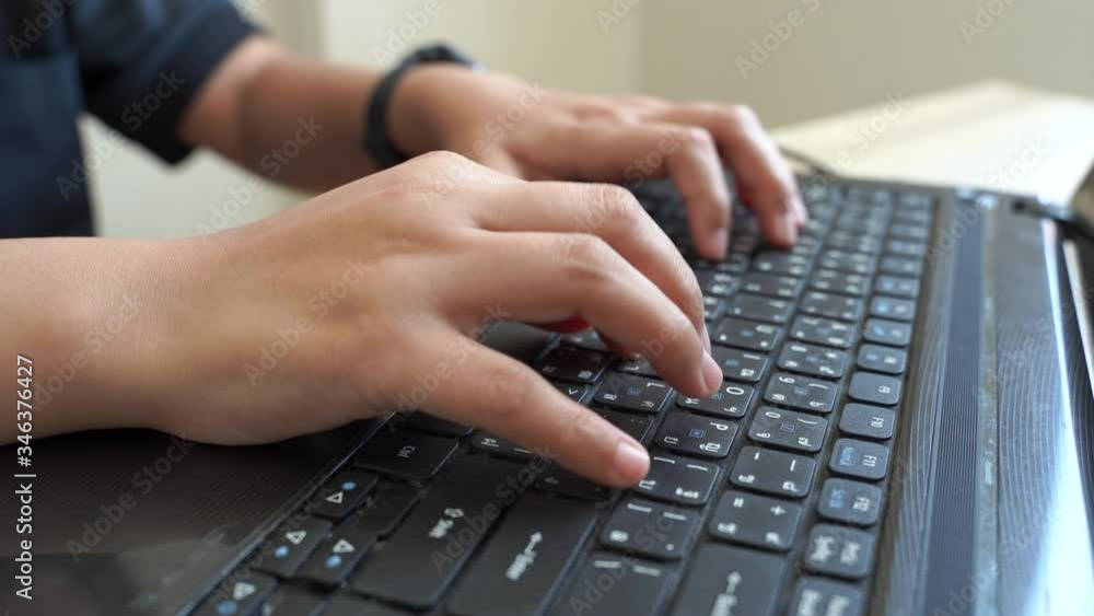 The close-up scene women's hands are typing keyboards during work from home. Documenting, e-mail, or chating in work from home concept close up shot in Apple Proress 422(HQ) 3840x2160 resolution. The close-up scene women's hands are typing keyboards during work from home. Documenting, e-mail, or chating in work from home concept close up shot in Apple Proress 422(HQ) 3840x2160 resolution.