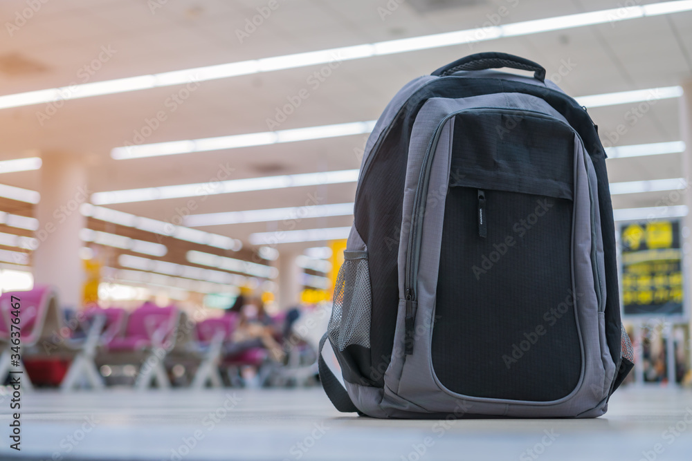 Backpack traveler reclaimed and Cancel flights stop and prevent COVID-19 virus disease.Travel bag suitcase in bus for State quarantine, restrict traveling to stop world pandemic COVID-19 Backpack traveler reclaimed and Cancel flights stop and prevent COVID-19 virus disease.Travel bag suitcase in bus for State quarantine, restrict traveling to stop world pandemic COVID-19