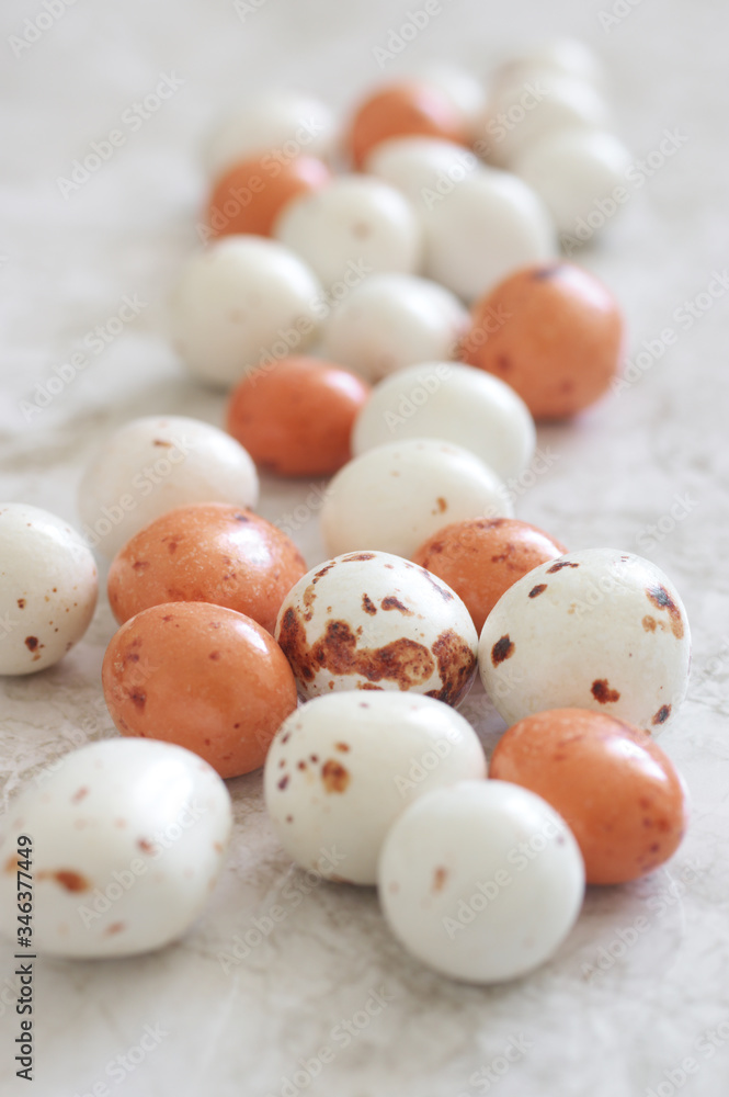 Spotted muted colored chocolate drops Spotted muted colored chocolate drops