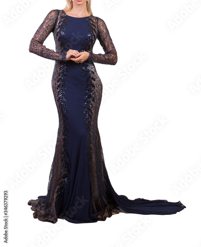 Beautiful woman dressed in evening gown over white background