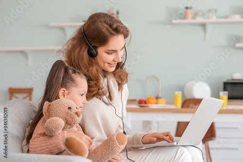 Working mother with little ...
