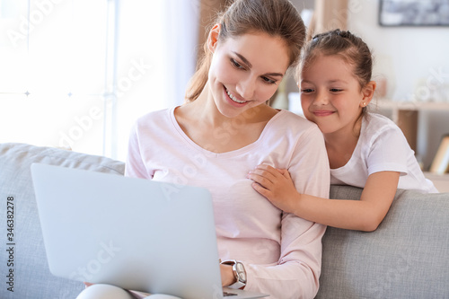 Working mother with little ...