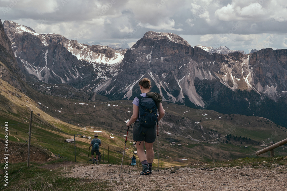 hiking in the mountains. tourist with backpack in the mountains. Dolomites, Italy