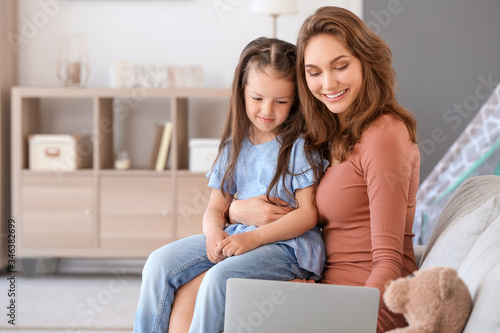 Working mother with little ...