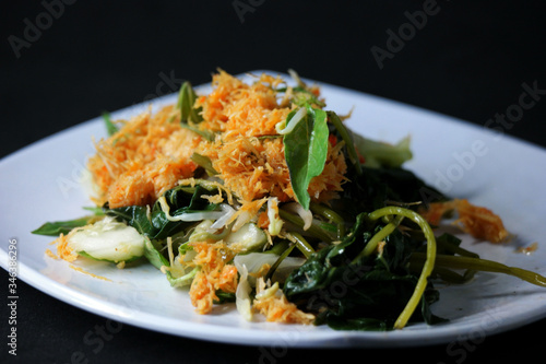 Steamed vegetables with shredded coconut