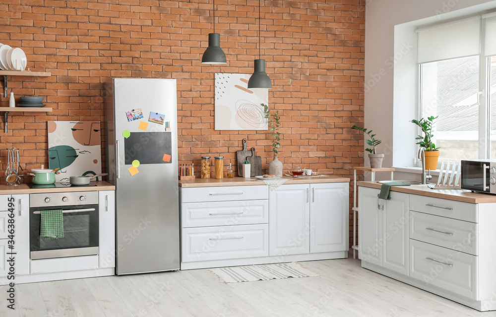 Stylish interior of modern kitchen with big refrigerator Stock Photo ...