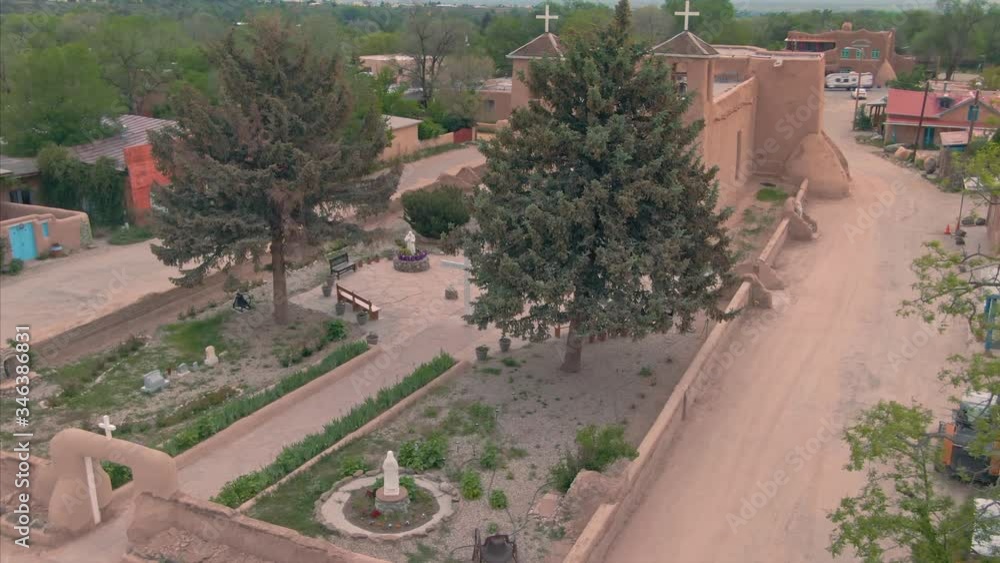 Santa Fe, New Mexico, USA. 1 May 2020. Aerial flying over San Francisco de Asis Mission, a pueblo style church Santa Fe, New Mexico, USA. 1 May 2020. Aerial flying over San Francisco de Asis Mission, a pueblo style church