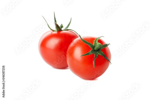 Fresh red tomatoes isolated on white background