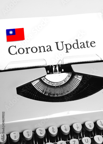 A Typewriter Typing the NEWS of COVID-19 with the Flag of Taiwan.