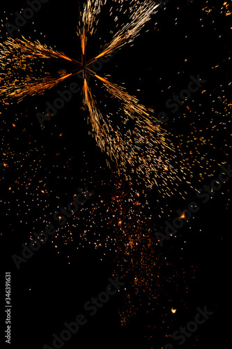 fireworks sparks on black background photo