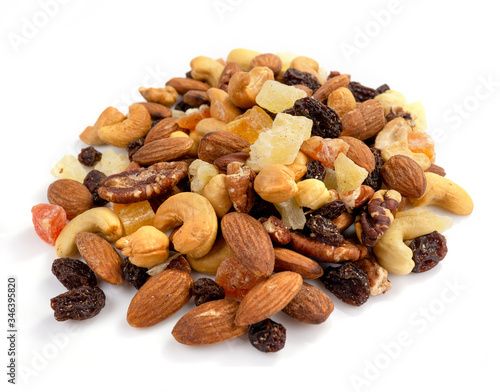 Mix of various nuts and dried fruit on white, Almonds, Raisins, Nuts, top view..