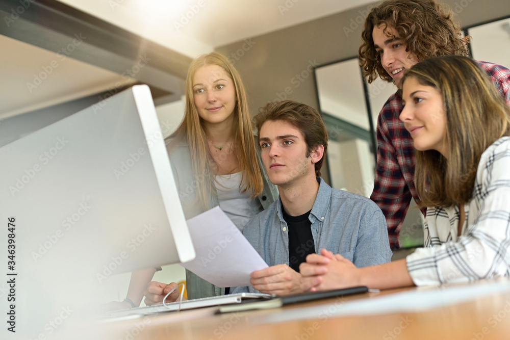 Group of students working together on project Group of students working together on project