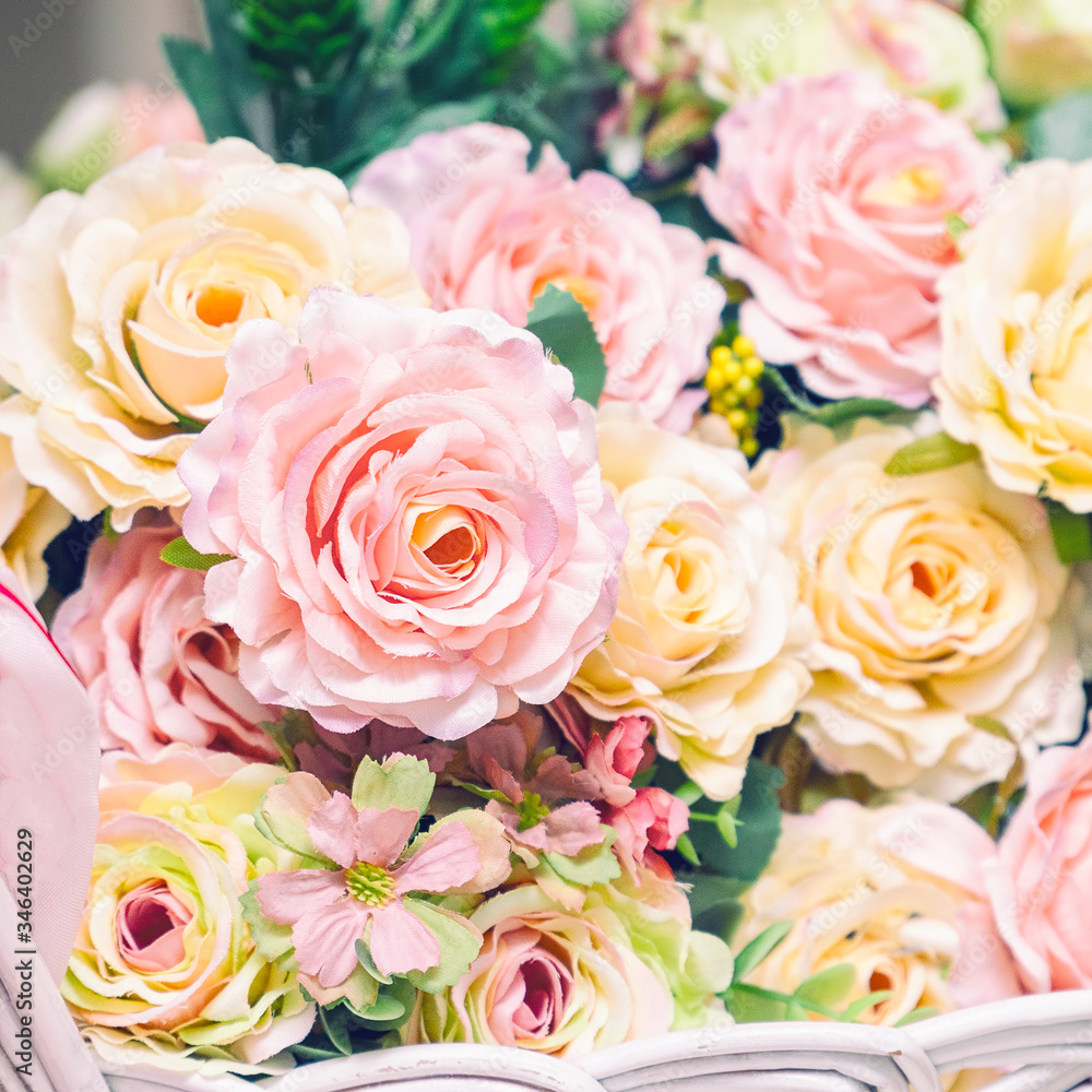 Bouquet of artificial pink roses close-up. Selective focus