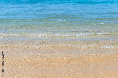 Clea sea water waving and sand beach, summer season, clean beach, tropical nature