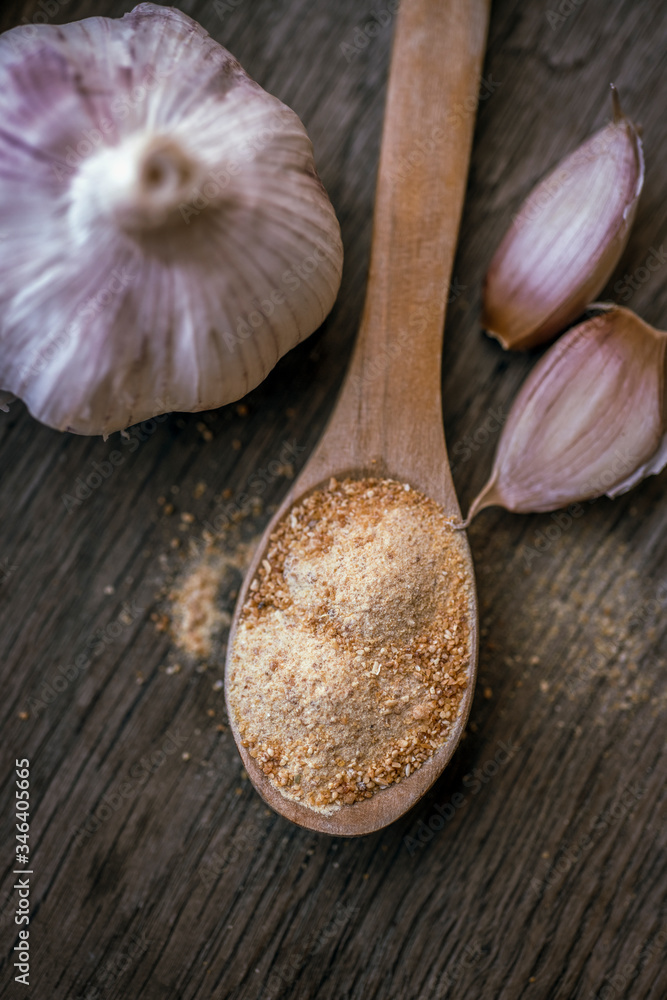 garlic on a wooden board garlic on a wooden board